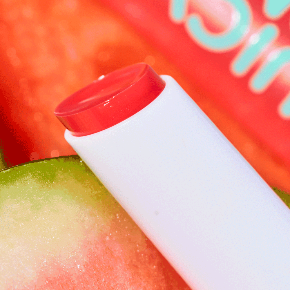 Bild: essence JUICY BOMB glossy butter balm One In A Melon